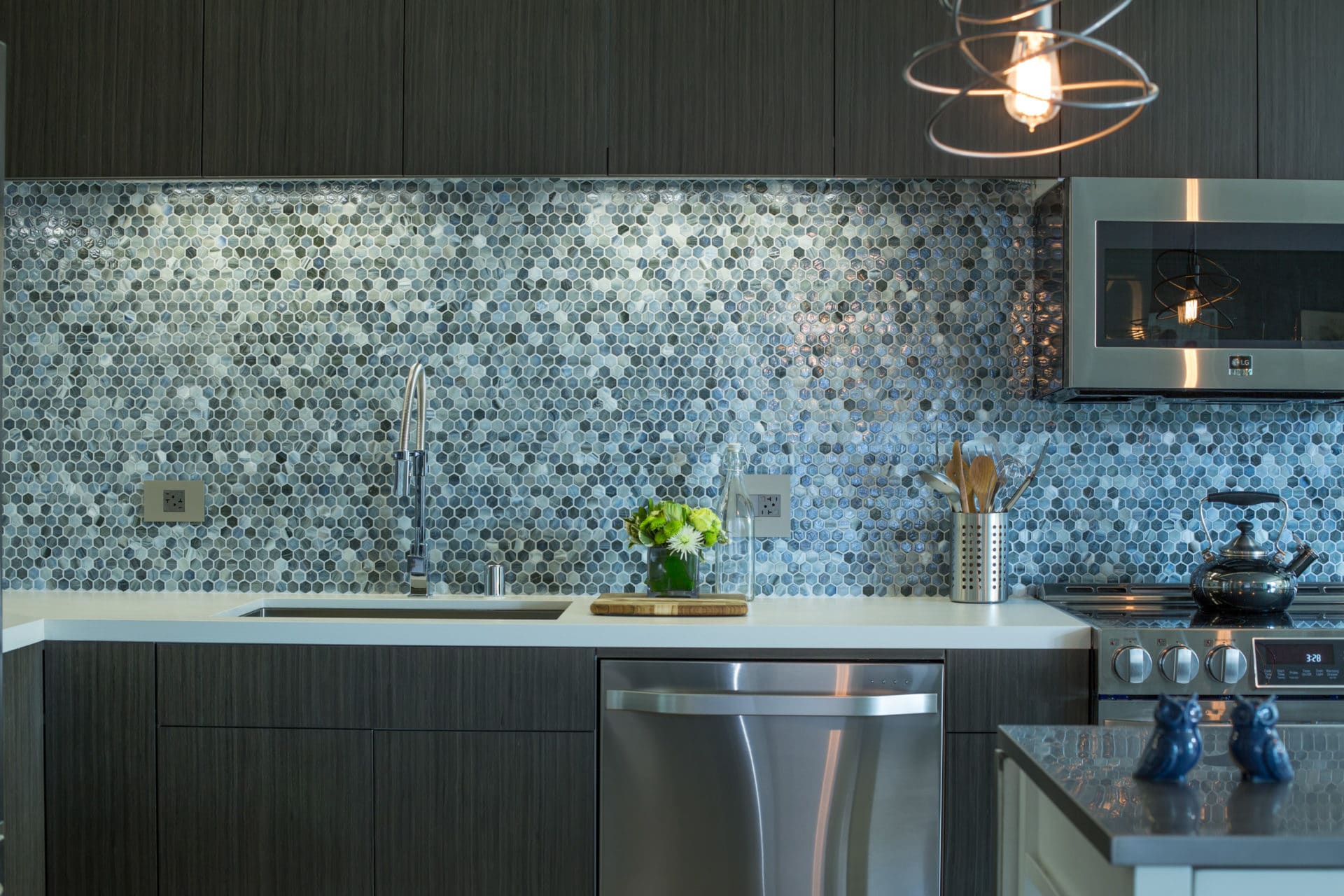 Ivory Kitchen Cabinets with Gray Flower Mosaic Tile Backsplash -  Transitional - Kitchen