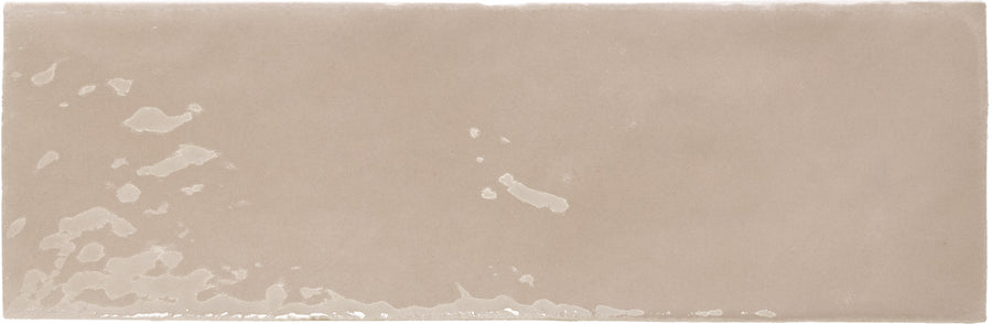 Rebels 2" x 6" Matte Subway Tile in rectangular beige ceramic, featuring a matte finish and subtly irregular white patterns along the left and lower edges.