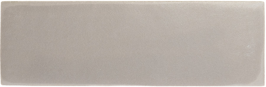 The Rebels 2" x 6" Matte Subway Tile features a smooth, light gray matte finish and slightly rounded edges, showcased on a white background.