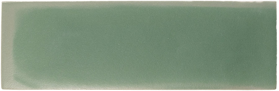 The Rebels 2" x 6" Matte Subway Tile in Moss Matte has a smooth surface and rectangular shape, making it a stylish choice for accent walls and adding a modern touch to any space.