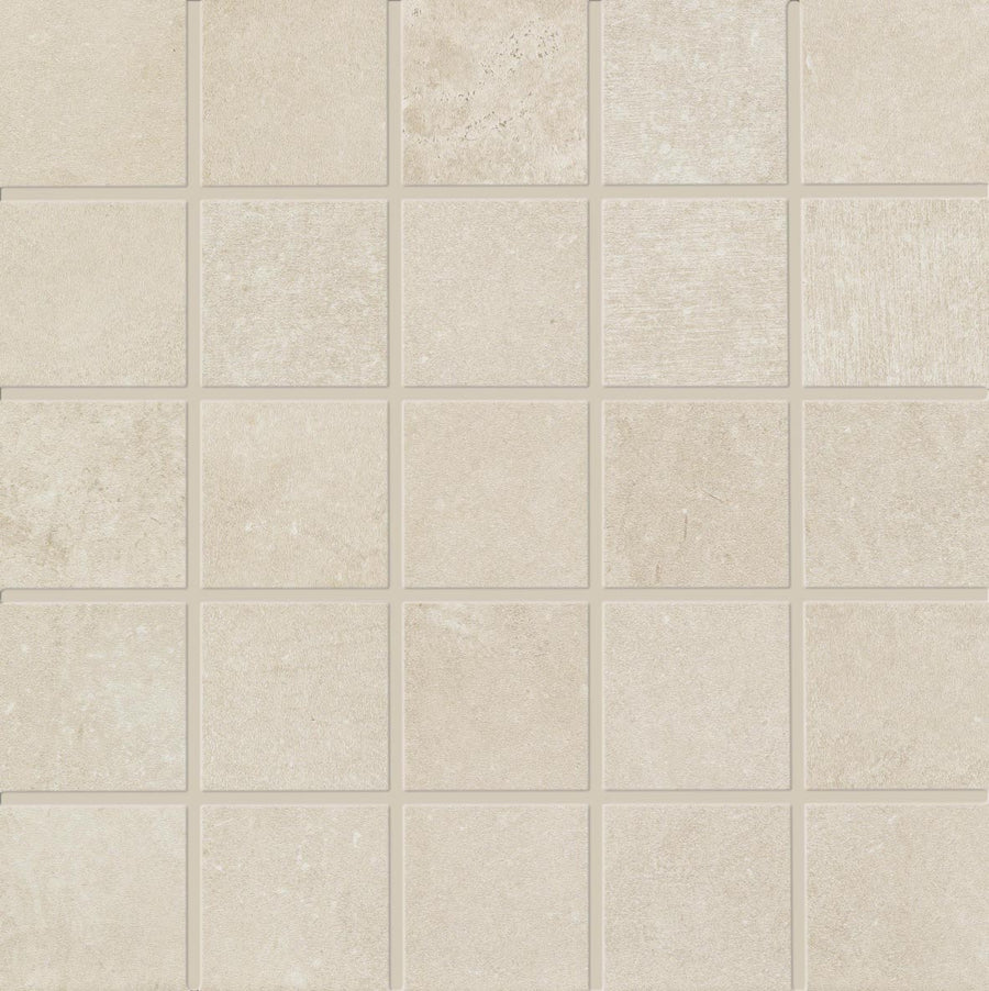 The Revolve 2x2 Mosaic Porcelain Tile features a grid of light beige, stone-like tiles with subtle texture and shading variations, separated by thin grout lines for a uniform, neutral look.