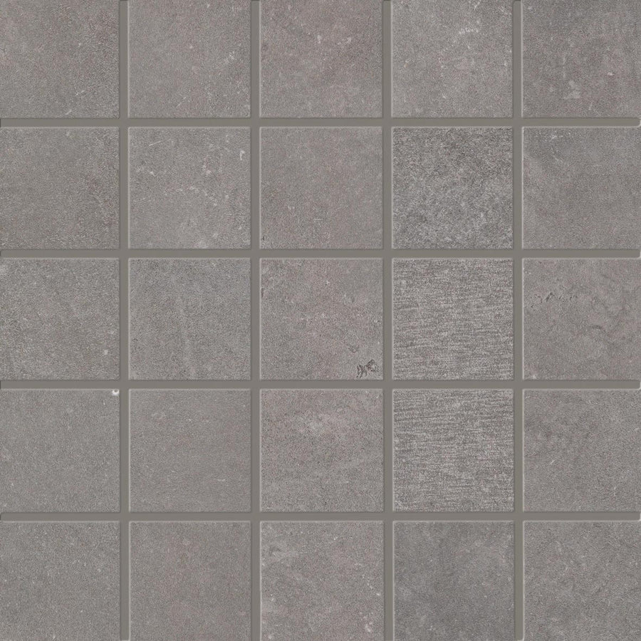 A grid of square Revolve 2x2 Mosaic Porcelain Tiles features gray stone-like texture, subtle color variation, and thin grout lines for a uniform tiled look.