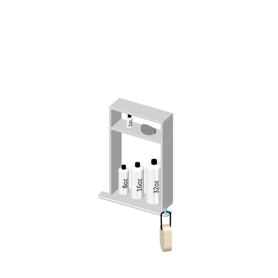 A white wall-mounted bathroom shelf holds three bottles labeled 8 oz, 16 oz, and 32 oz. A fourth small bottle sits on the top shelf, and a bar of soap hangs from a hook on the right side.