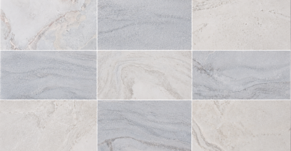 Nine rectangular tiles arranged in a grid, each featuring the Blue Horizon 12x24 Honed Marble Tile's blue marbled pattern and refined stone textures, evoke the elegance of honed marble.