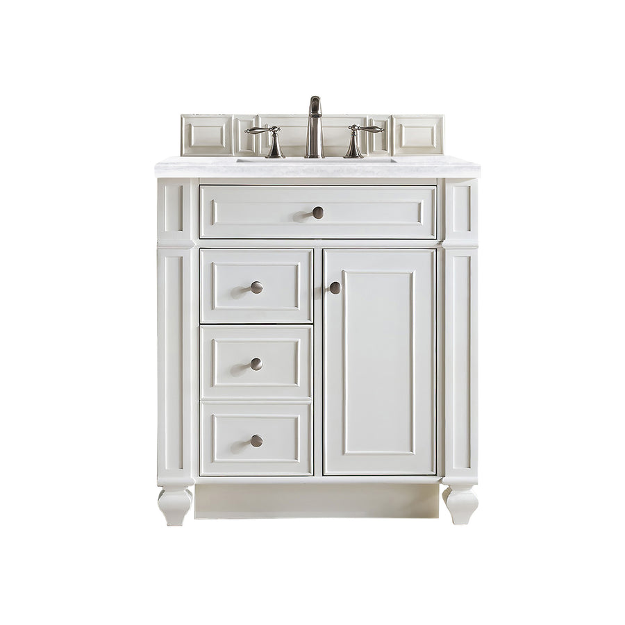 White bathroom vanity with a marble countertop, chrome faucet, three drawers on the left, and a cabinet door on the right, all featuring round metal knobs. Set against a plain white background.