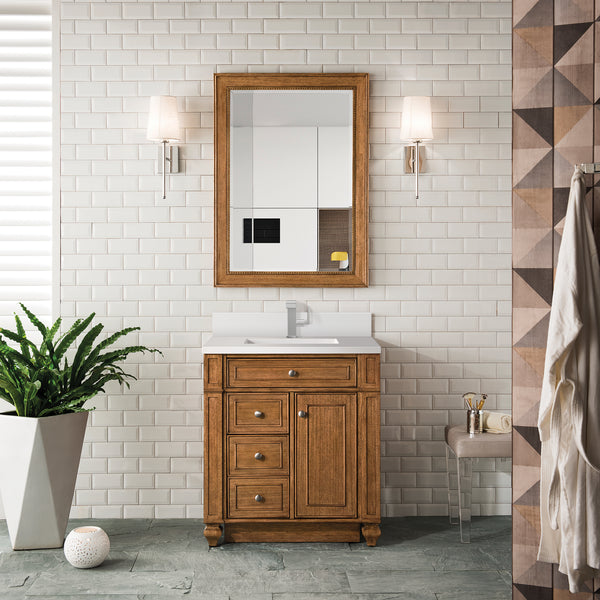 A small bathroom with white subway tile walls, a Bristol 30
