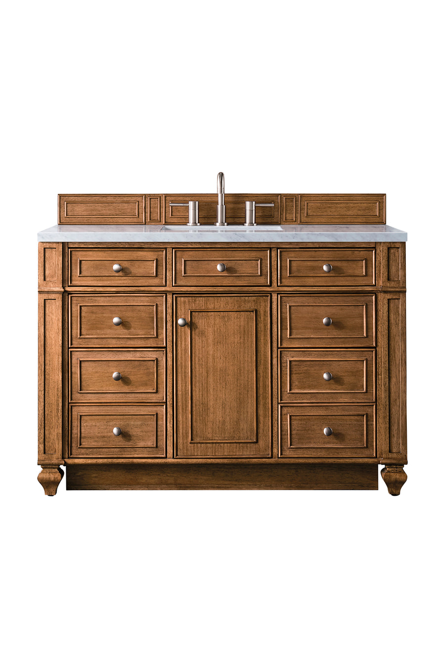 A wooden bathroom vanity with nine drawers, a central cabinet door, silver knobs, a white marble countertop, a built-in sink, and a modern faucet.