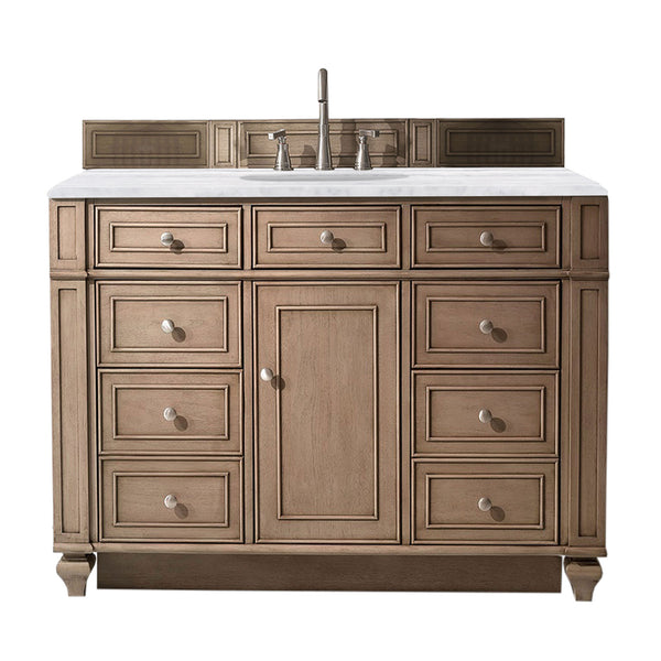 A wooden bathroom vanity with a marble countertop, silver faucet, and multiple drawers and cabinet doors, isolated on a white background.