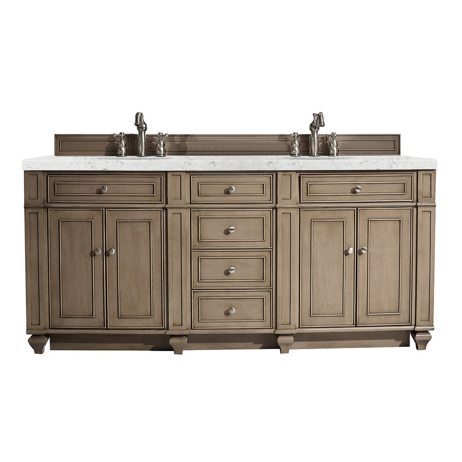 The Bristol 72" Double Bowl Vanity features a transitional design in light brown wood, multiple drawers and cabinets, a marble countertop, and two silver faucets.