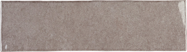 A rectangular, light brown bath mat with a simple, solid design and lightly textured surface—perfect for pairing with Radiance 3