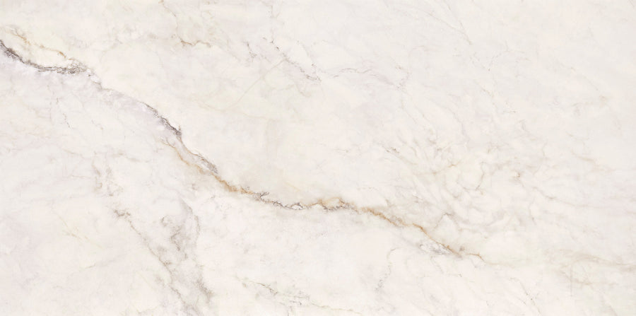 The Tuscany Oro 24" x 48" Tile in Natural features a white marble surface with subtle grey and beige diagonal veining, offering a smooth, elegant texture—ideal for a refined look with large-format Italian style.