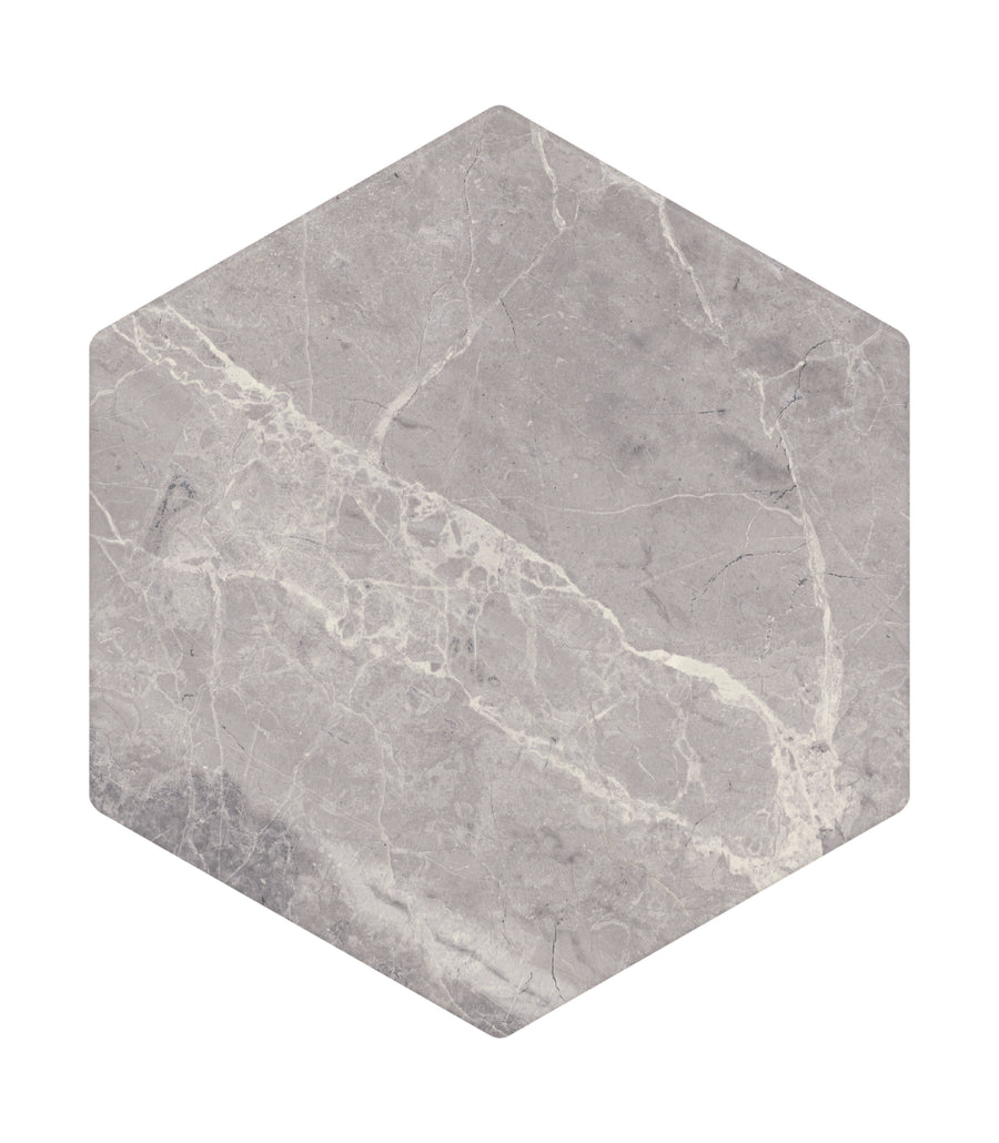 The Veil 8" x 8" Hex Tile in Mystic Natural features a light gray marble texture with faint gray veins and a sleek geometric design on a white background.