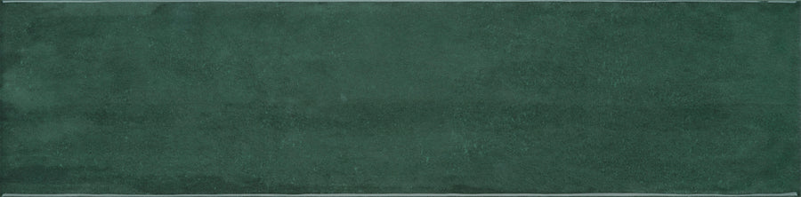 A flat, rectangular Juniper-green surface resembling the Muse 4" x 16" Glossy Subway Tile, featuring a slightly textured look and subtle shading along the edges.