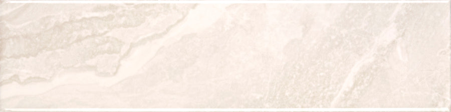 Veil 4" x 16" Subway Tile in White Mystic Glossy features marble-inspired patterns and a slim white border, ideal for bringing subtle elegance to modern interiors.