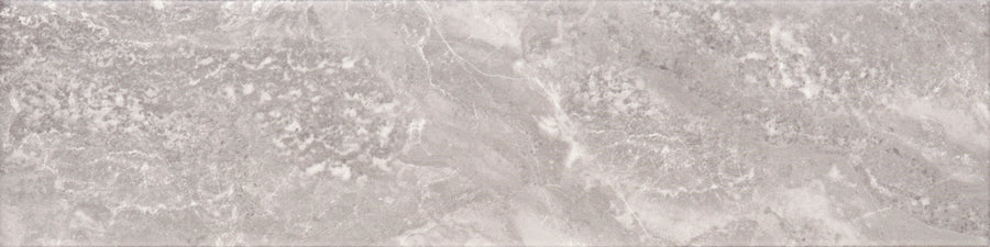 Veil 4" x 16" Subway Tile in Mystic Matte offers a light gray marble texture with soft veins and subtle white streaks, perfect for modern interiors seeking an elegant, luxurious look.