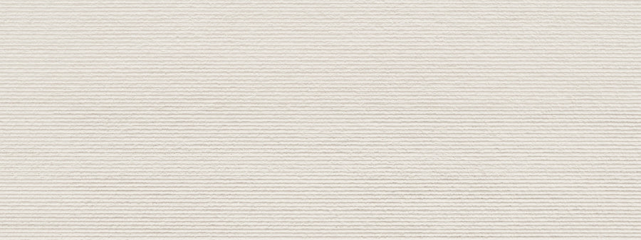 A close-up of the Dynasty 18" x 48" Deco Matte Rectified Tile in White shows vertical ridges and a soft, textured surface with evenly spaced, parallel lines, reminiscent of corduroy fabric.
