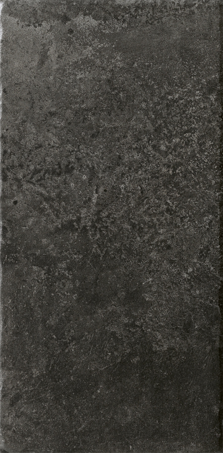 The VersaTILE 8x16 Glazed Porcelain Tile in Belgian Dark features a textured surface with subtle color variations and rough patterns, creating a sophisticated, natural look ideal for upscale interiors.