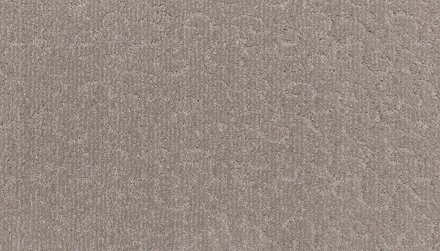 Fleurious Pet Friendly Carpet features a beige hue with a subtle textured swirl pattern, offering luxurious comfort and durability—an ideal choice for stylish, pet-friendly homes.