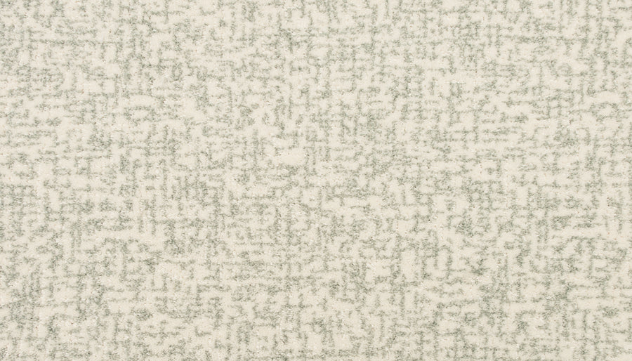 A close-up of the Latticework On Trend Carpet highlights its white surface and subtle modern texture.
