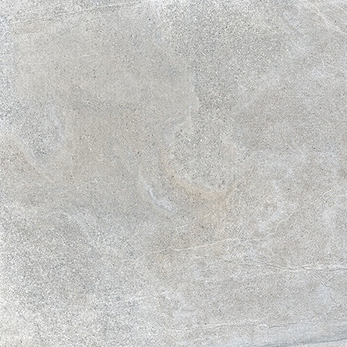 A close-up of a light gray concrete surface with subtle texture, fine cracks, and faint variations in color, giving it a natural, slightly worn appearance.
