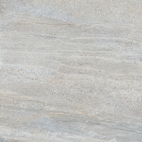 A close-up view of a smooth, light gray stone surface with subtle veining and fine texture, displaying natural patterns and variations in tone.
