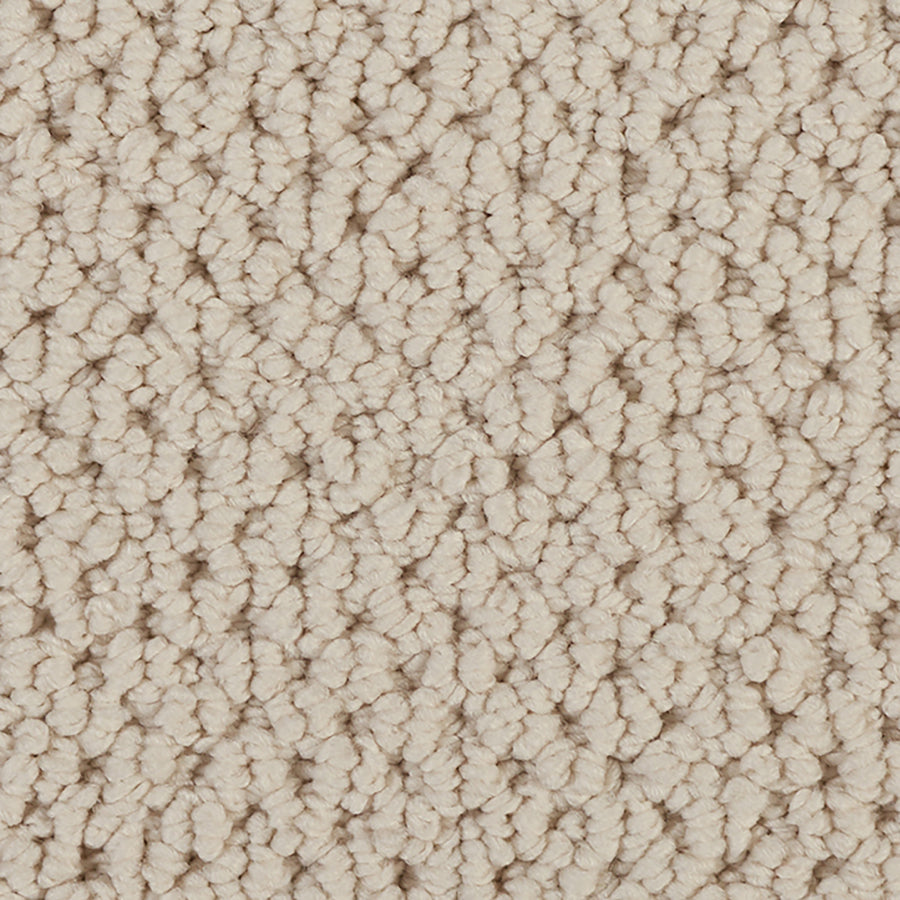 Close-up of Kinetic Detail Berber Carpet in beige, featuring tightly looped fibers for a soft, textured surface that's ideal for modern interiors.