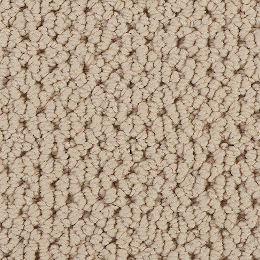 Close-up of Kinetic Detail Berber Carpet in beige, featuring a tightly woven, textured looped pile. Its soft, cushioned surface is perfect for adding stylish comfort to any interior design.