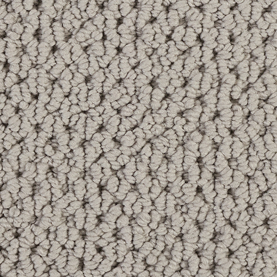 Close-up of Kinetic Detail Berber Carpet in light gray, featuring a dense, even loop texture. The soft, plush material and tightly woven fibers make it ideal for residential interiors and modern design.