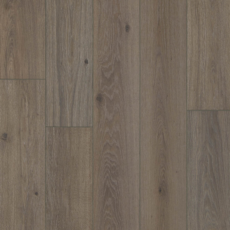 Close-up of Haven 7 9/16" Waterproof Laminate in Coffee color, featuring realistic wood grain with brown tones and subtle knots for a rustic, natural look.