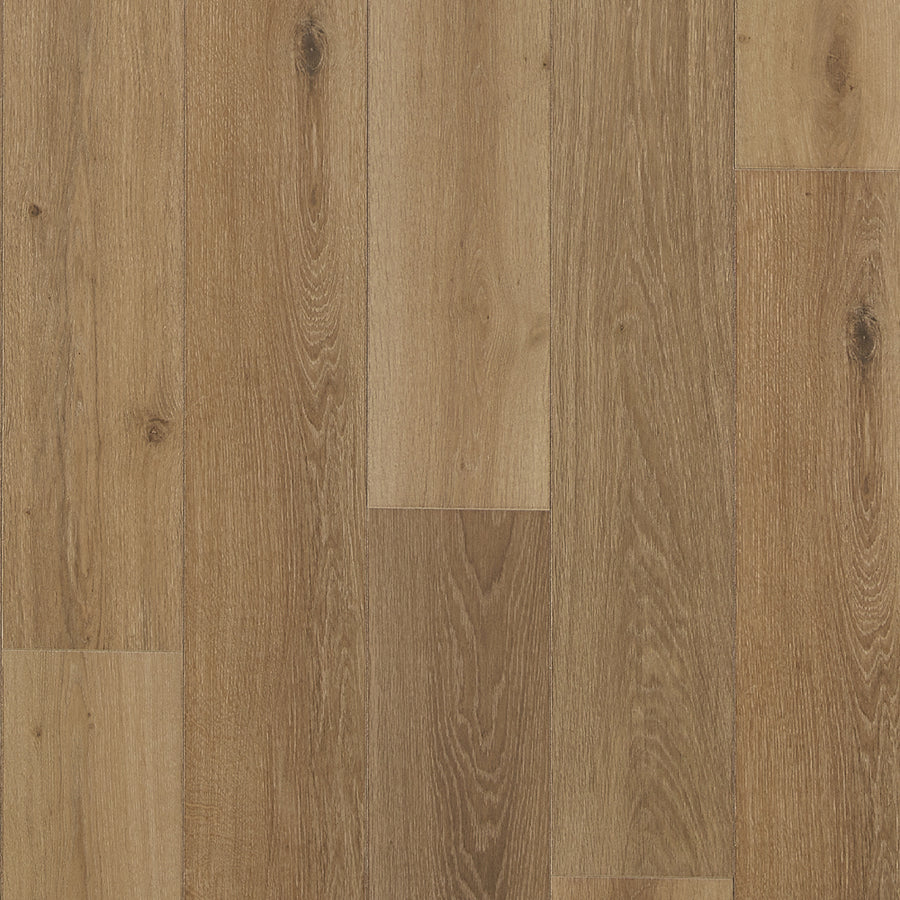 Haven 7 9/16" Waterproof Laminate in Honey displays light to medium brown planks set side by side, highlighting natural wood grain patterns and subtle color variations.