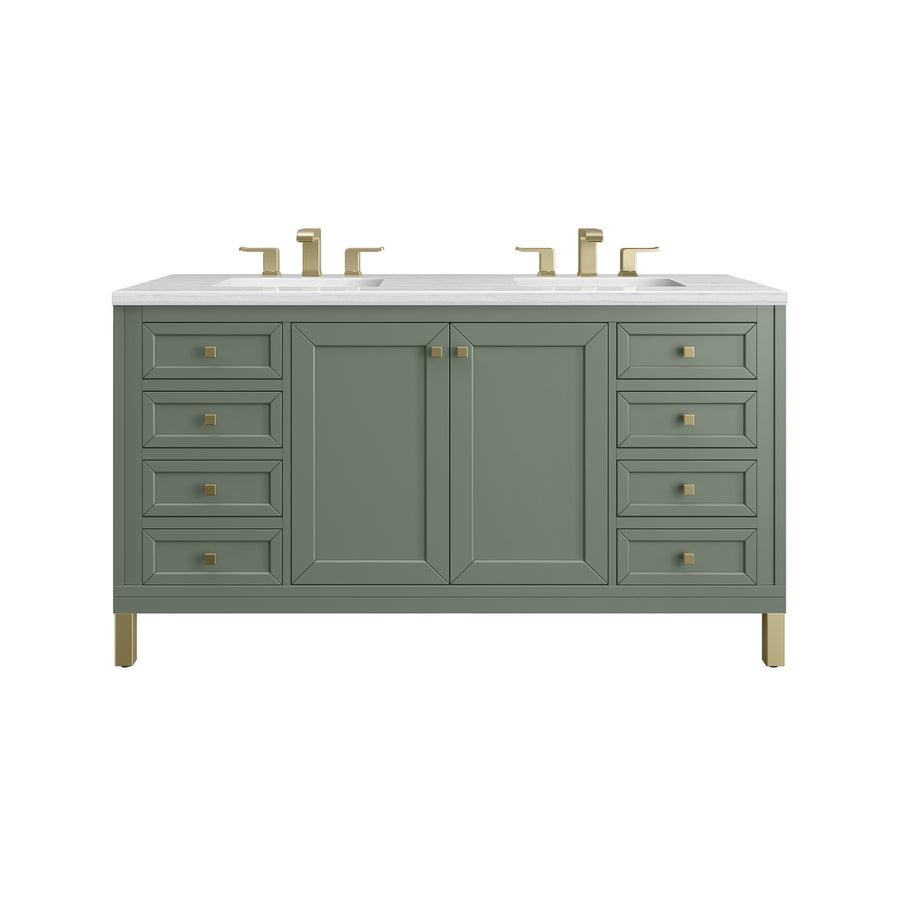 Green double-sink bathroom vanity with a white countertop, gold faucets, matching gold handles, and legs. It has two sinks, four central doors, and eight side drawers.