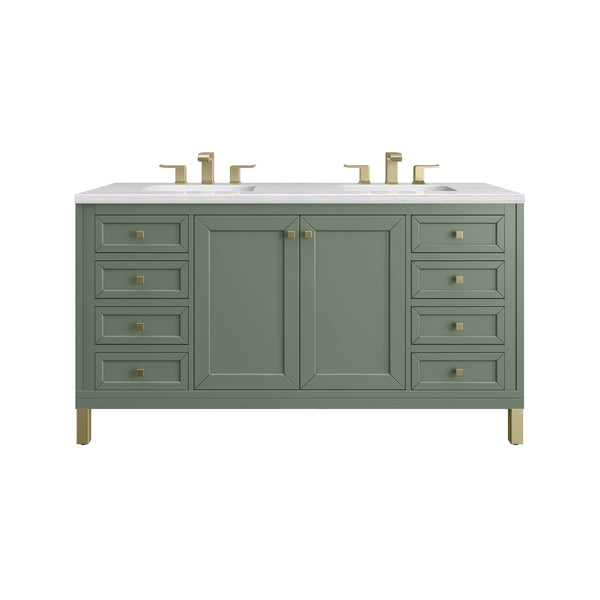 Green double-sink bathroom vanity with a white countertop, gold faucets, matching gold handles, and legs. It has two sinks, four central doors, and eight side drawers.