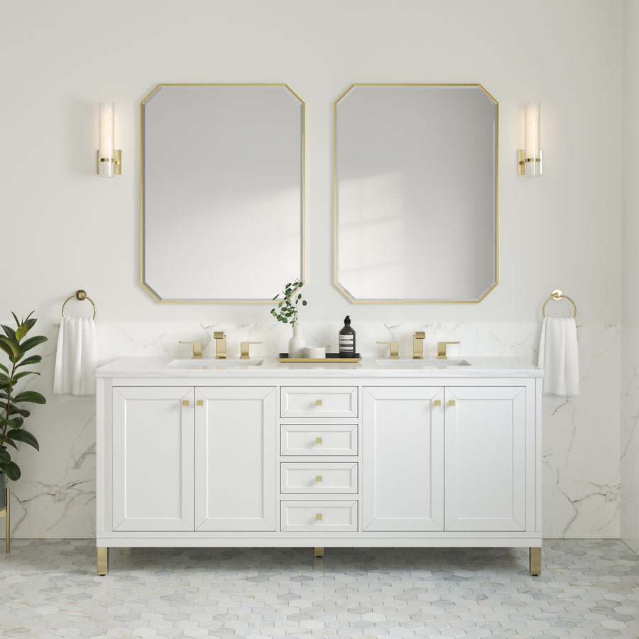 Elegant bathroom features the Chicago 72" Double Bowl Vanity with gold fixtures, twin octagonal mirrors, white marble backsplash, wall sconces, white towels, and a green plant on the left for added sophistication.