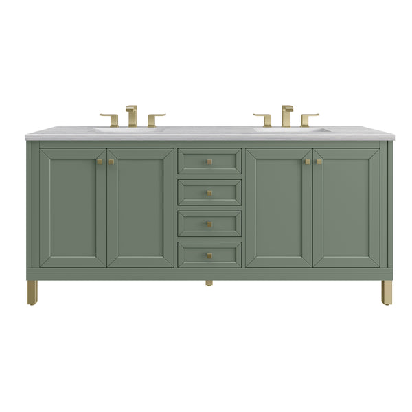 A green double-sink bathroom vanity with a white countertop, four central drawers, and two cabinets on each side. The hardware, including faucets, drawer pulls, and legs, is gold-colored.