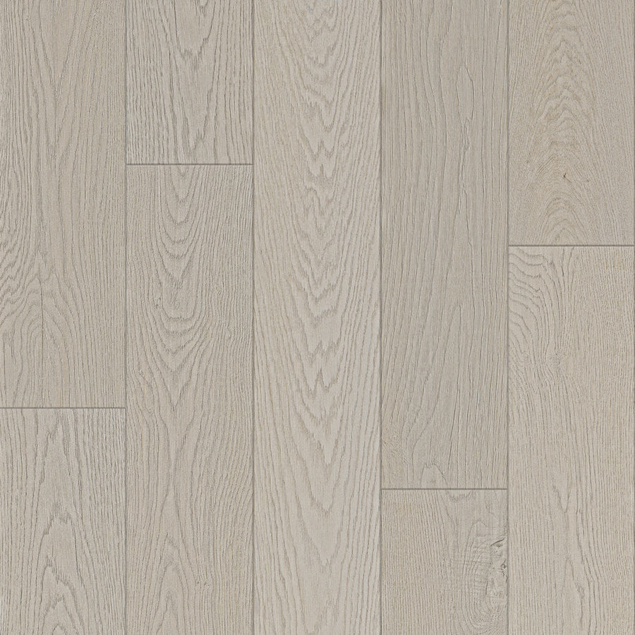 Bespoke 8" Waterproof Laminate in Wicker features light-colored wood planks with natural grain patterns and subtle shade variations, arranged in a parallel layout.