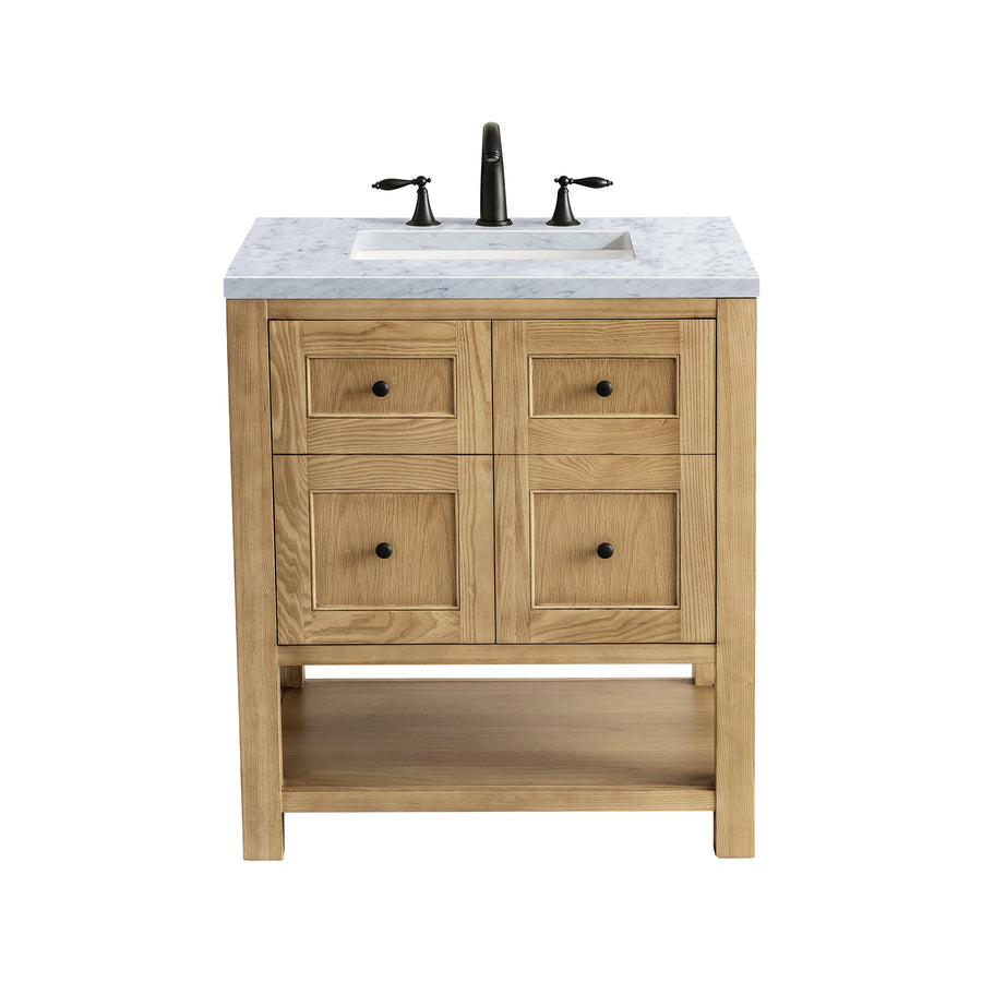 A wooden bathroom vanity with four drawers, an open shelf at the bottom, a white marble countertop, a rectangular sink, and a dark faucet with two handles.