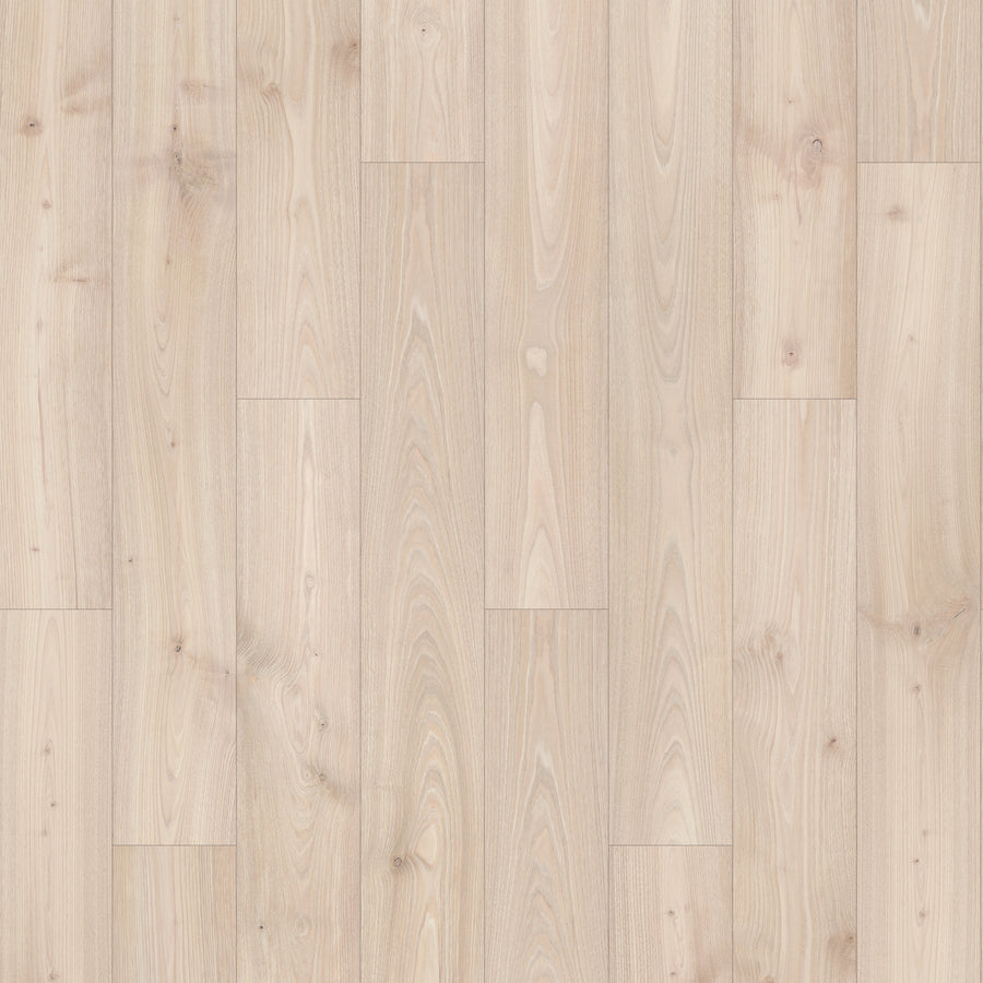Madison Aisle 7 1/2" Laminate in PEWTER CHESTNUT features a light wood-look with natural grain, subtle knots, and a matte, scratch-resistant finish. Planks are arranged in a staggered layout for a clean, modern style.