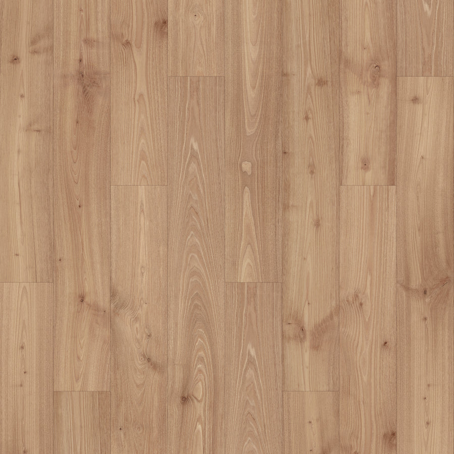 Madison Aisle 7 1/2" Laminate in BRASS CHESTNUT features a smooth wood-look finish with visible grain and knots, offering a natural, light brown appearance for your floors.