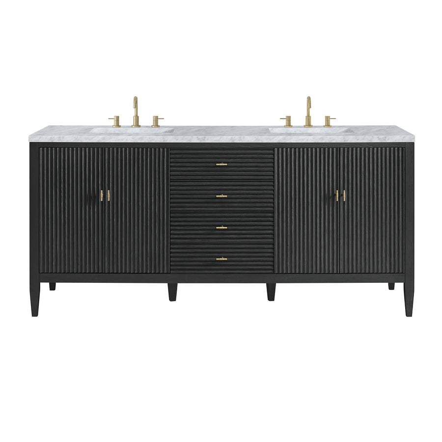 A modern double-sink vanity with a white marble countertop, two gold faucets, black fluted cabinet doors, central drawers, and gold hardware. The unit stands on tapered legs.
