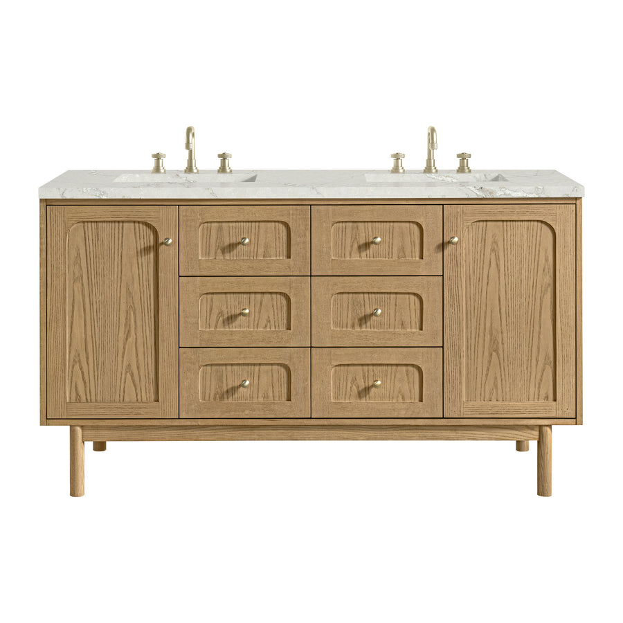 A wooden double-sink bathroom vanity with a white countertop, two cabinet doors on each side, and six central drawers with round gold knobs. Two silver faucets are mounted above the sinks.