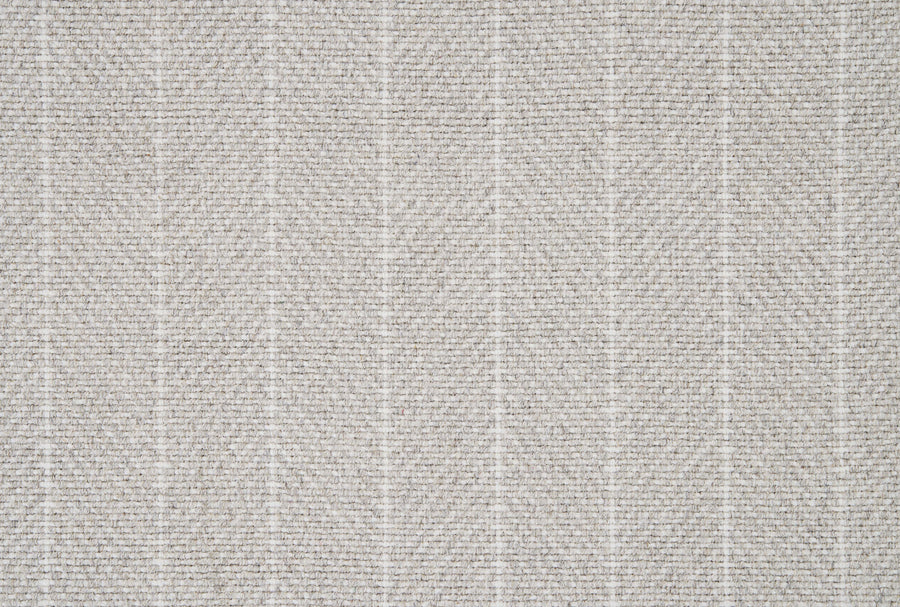 Close-up of Addington Berber Carpet in light gray, showing a textured, tightly knit woven surface with subtle vertical white stripes—soft and durable, ideal for premium flooring.