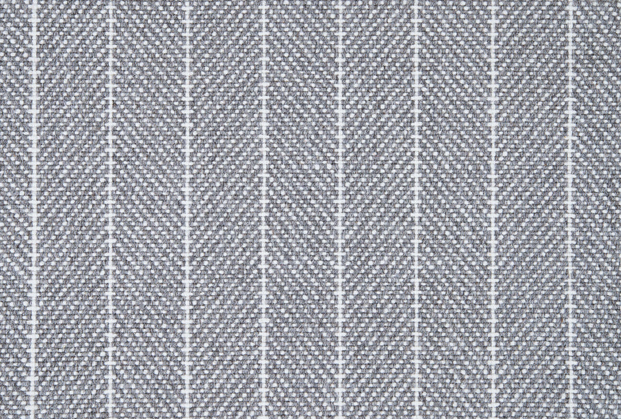 Close-up of Addington Berber Carpet in Dark Gray, featuring a textured surface with visible weave and evenly spaced vertical white stitched lines, creating a subtle grid-like pattern reminiscent of premium flooring.