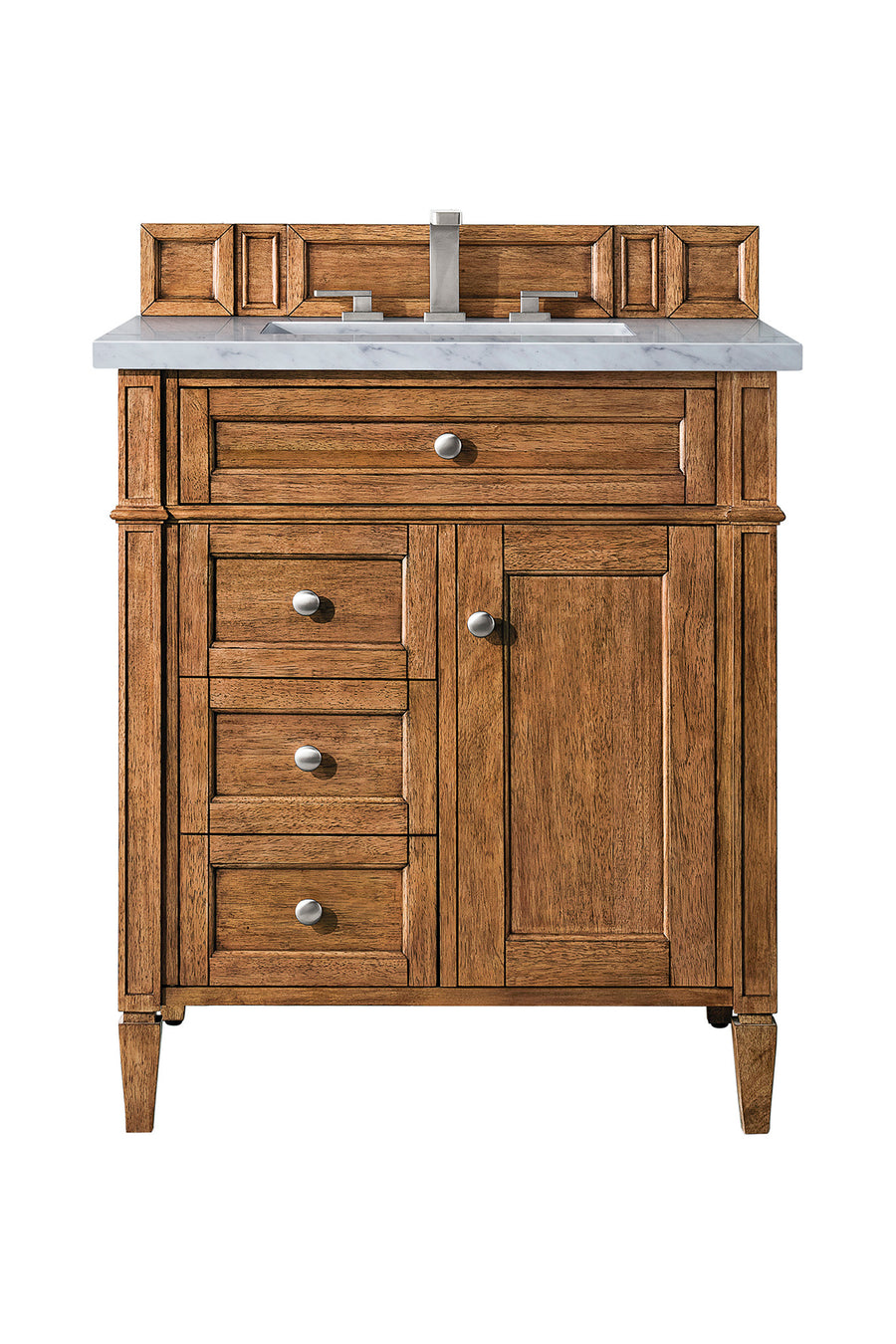 A wooden bathroom vanity with a marble countertop, four drawers on the left, a cabinet door on the right, and a modern faucet. The wood has a natural finish and silver handles.