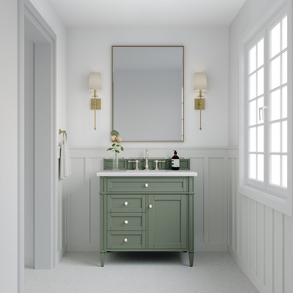 A bright bathroom features a green Brittany 36