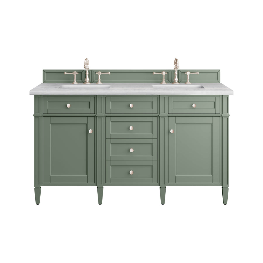 A green double-sink bathroom vanity with a white countertop, two faucets, multiple drawers, and cabinets, all featuring round metal knobs.