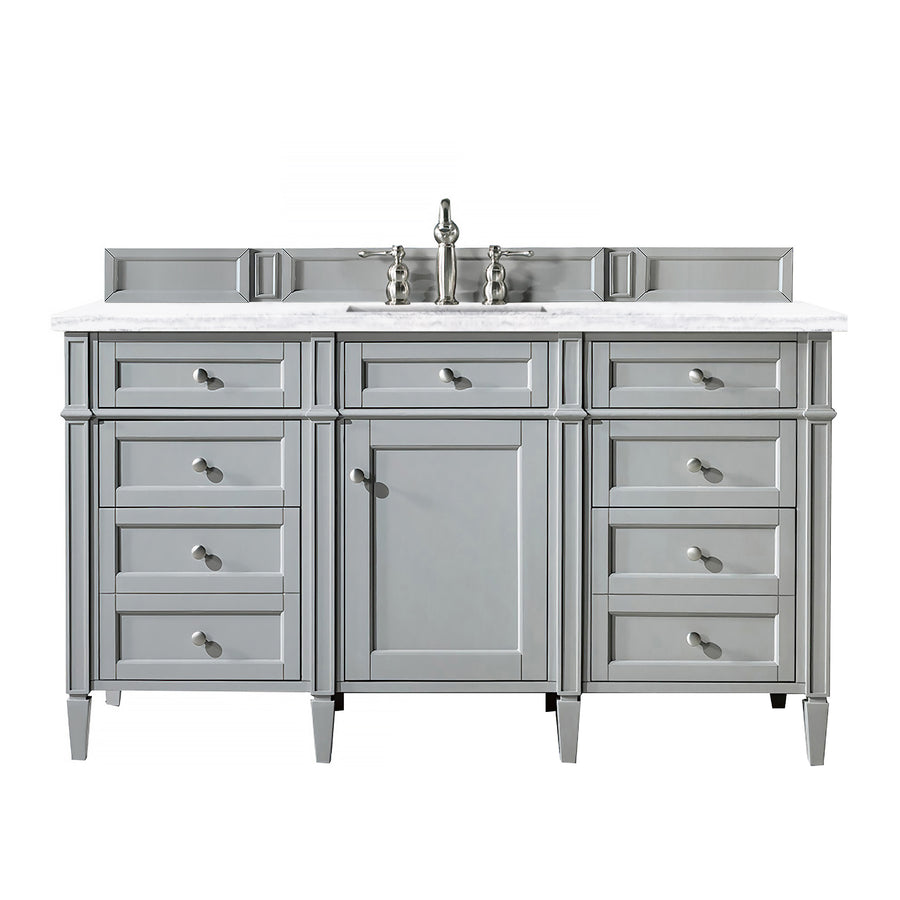 A gray bathroom vanity with six drawers, a central cabinet, silver handles, a white marble countertop, and a silver faucet.