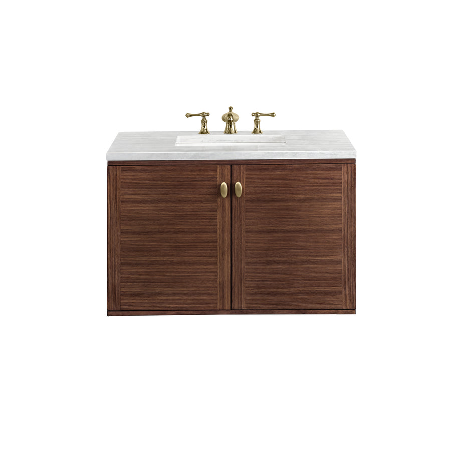 A bathroom vanity with a wooden cabinet, double doors, brass handles, a white countertop, and a built-in sink with gold faucet fixtures, set against a white background.