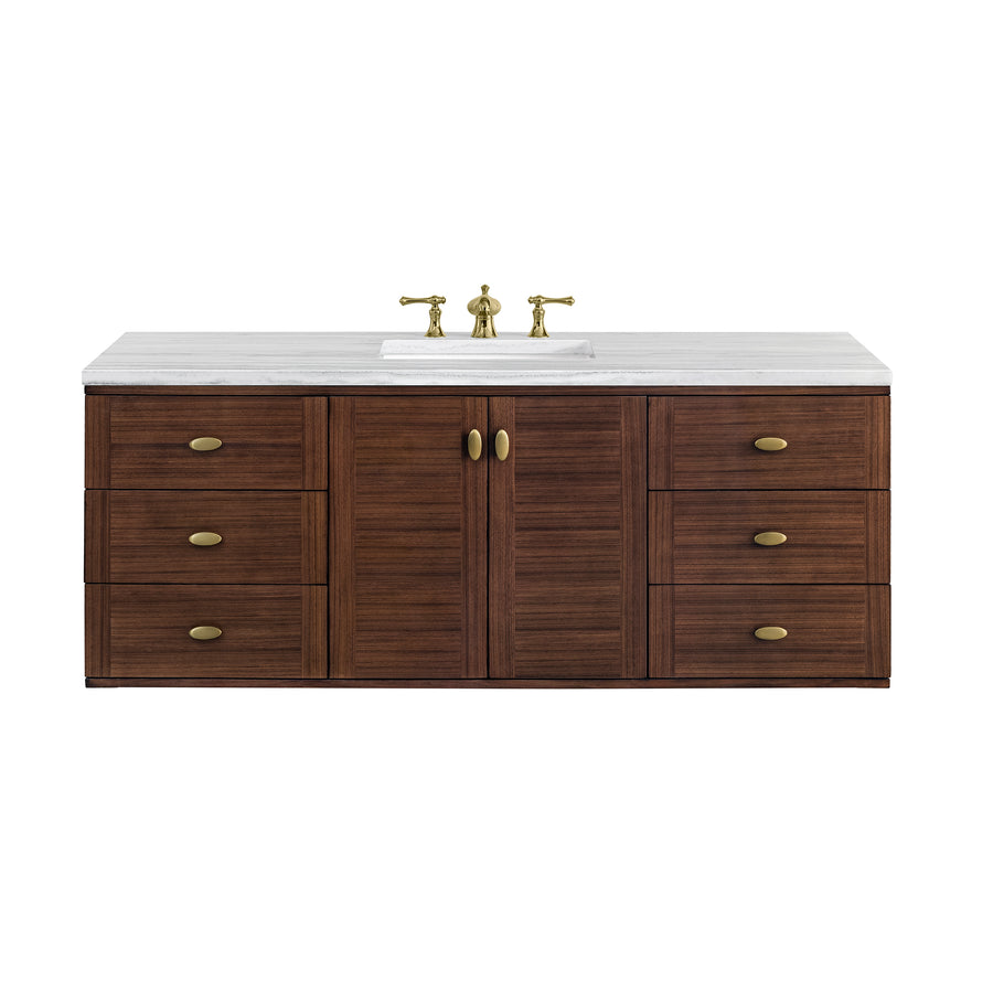 Wooden bathroom vanity with six drawers and two central doors, topped with a white marble countertop, an undermount sink, and brass faucet fixtures.