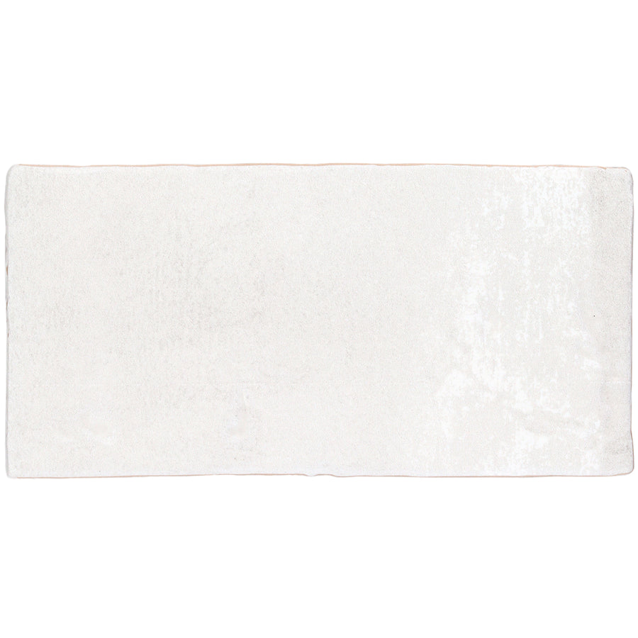 A rectangular, white Morocco 4x8 Body Ceramic Tile with a smooth, matte finish is viewed from above against a plain background.