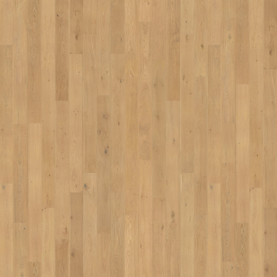 Pacifica 7 11/16" Waterproof Laminate in Deep Sand Sea features a natural grain pattern and moisture resistance, with tan and beige tones. Planks are laid lengthwise for a clean, warm look ideal for modern or rustic interiors.